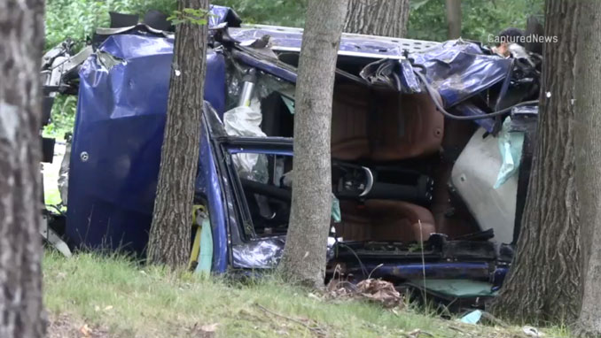 Close-up of a wrecked blue Mercedes on its side off Brinker Road near Hills and Dales Road in Barrington Hills the morning after a single-vehicle crash overnight Friday/Saturday, July 25, 2026 (CapturedNews).