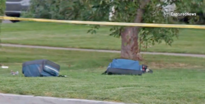 Duffle bags examined as evidence at the scene of a shooting in the block of 300 Walker Avenue in Highland Park, Monday night, July 20, 2026 (PHOTO CREDIT: Craig/CapturedNews).