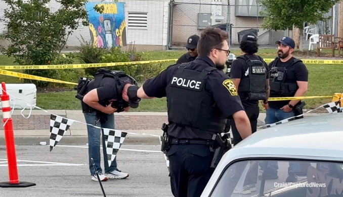 Active investigation scene at Scoop Waukegan 2026 after a shooting on Genesee Street near Washington Street in downtown Waukegan on Saturday, July 11, 2026 (Craig/CapturedNews)