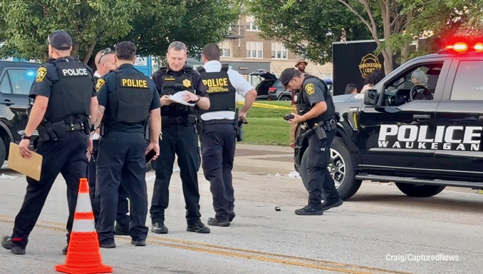 Active investigation scene at Scoop Waukegan 2026 after a shooting on Genesee Street near Washington Street in downtown Waukegan on Saturday, July 11, 2026 (Craig/CapturedNews)