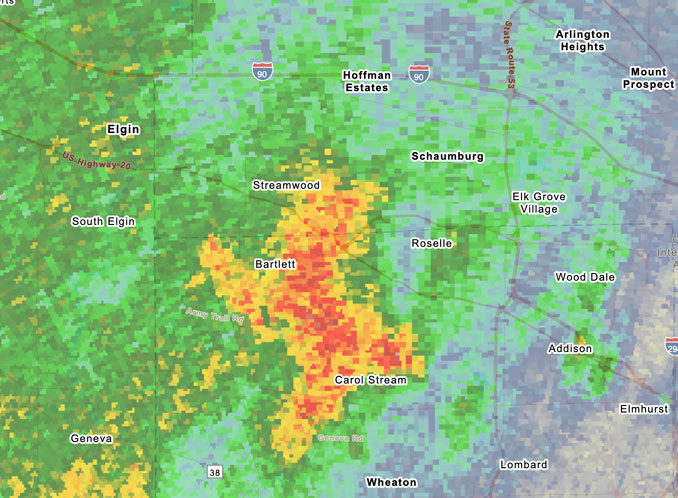 A thunderstorm that was predicted to arrive in Arlington Heights about 3:20 p.m. has stalled and fluctuated southwest of Arlington Heights and was mostly over Bartlett, Illinois at 4:07 p.m. on Saturday, July 4, 2026 (NWS Station KLOT in Chicago)